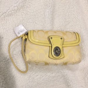 Yellow coach wristlet